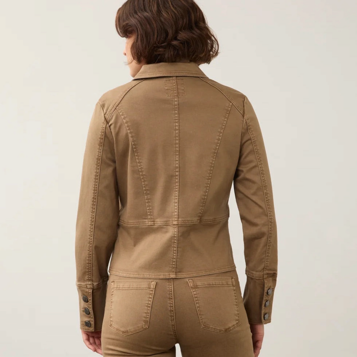 Back view of Plum Bottom FDJ utility jacket in maple brown cotton-blend fabric with contoured seams