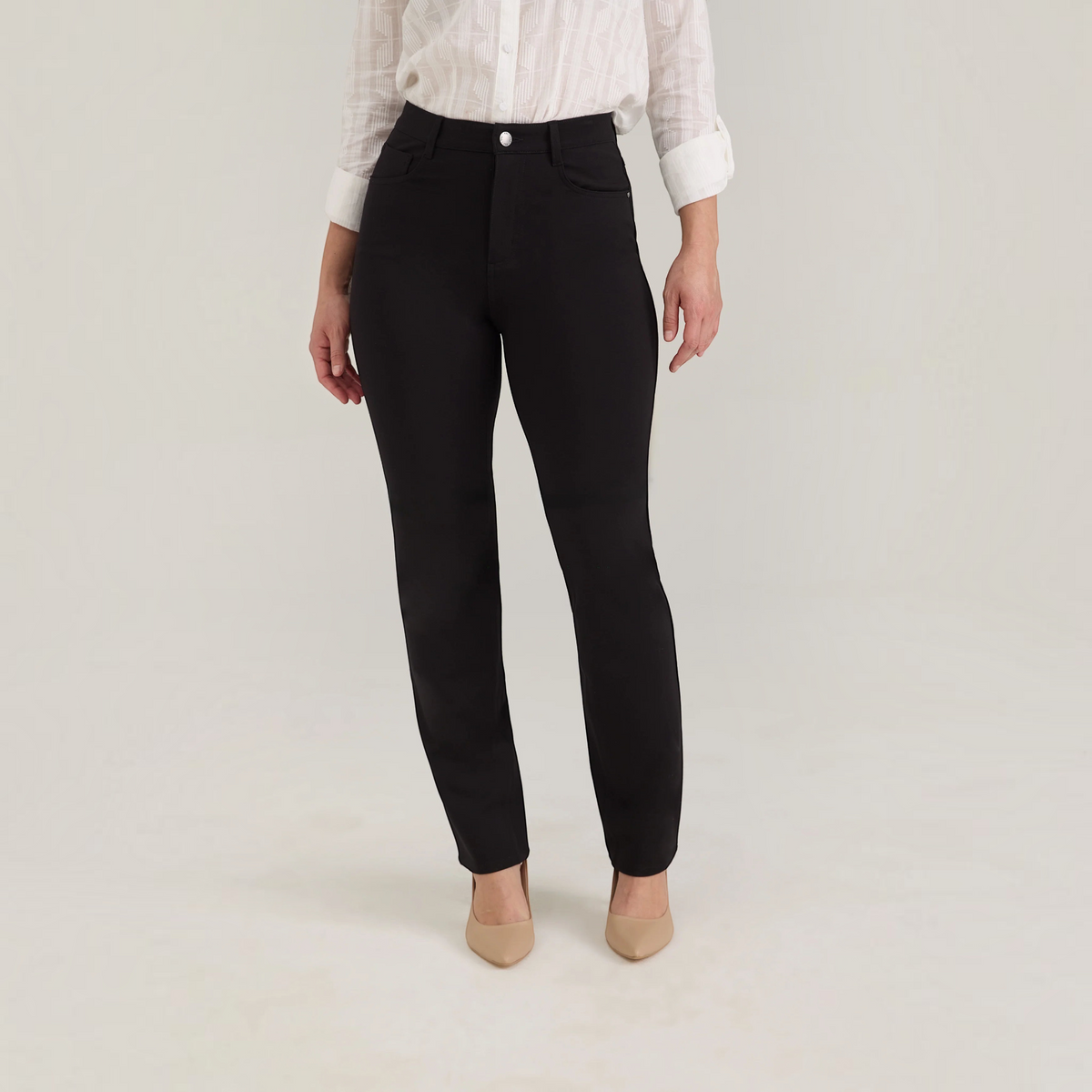 Plum Bottom FDJ Suzanne black high-rise straight leg pants in responsive ponte fabric worn with a white shirt
