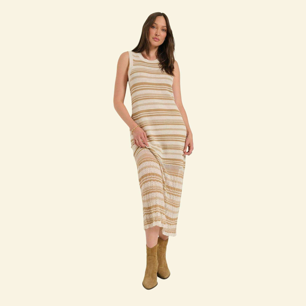 Plum Bottom Seventy Eight and Sunny Ruby crochet midi dress with sheer pointelle stripes and an attached nude slip.