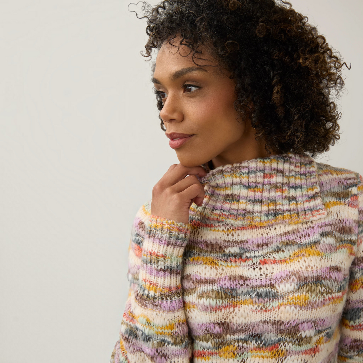 Plum Bottom FDJ envelope collar sweater featuring a multi-colored space dye knit pattern on a model.