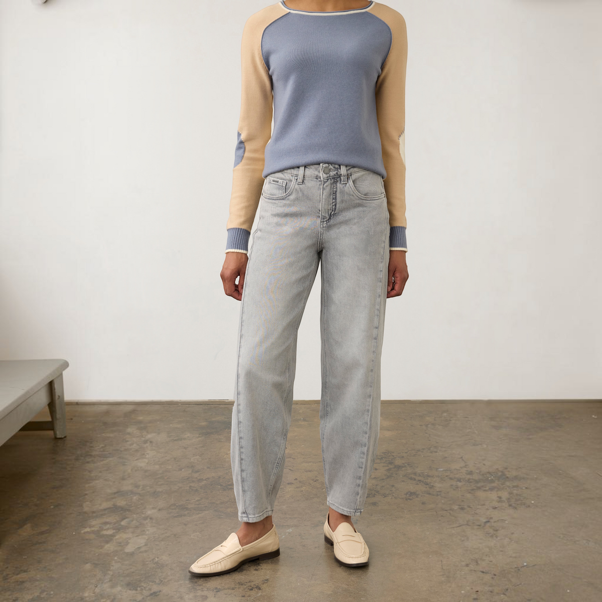 Plum Bottom FDJ Girlfriend barrel ankle jeans in light wash denim paired with a color-blocked sweater and loafers