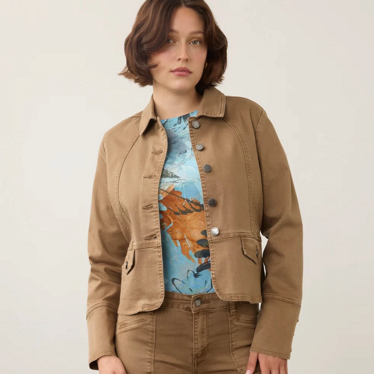 Plum Bottom FDJ utility jacket in maple cotton-blend with button-up front and flap pockets on a model