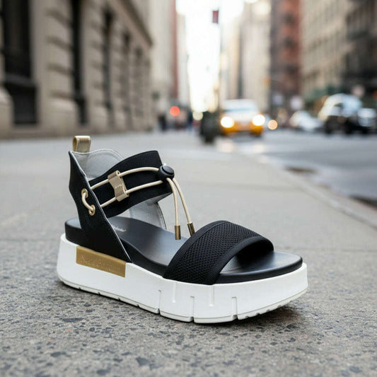 nero-giardini-e410700d-flatform-sandalsandalsnero-giardiniplum-bottom-35913694