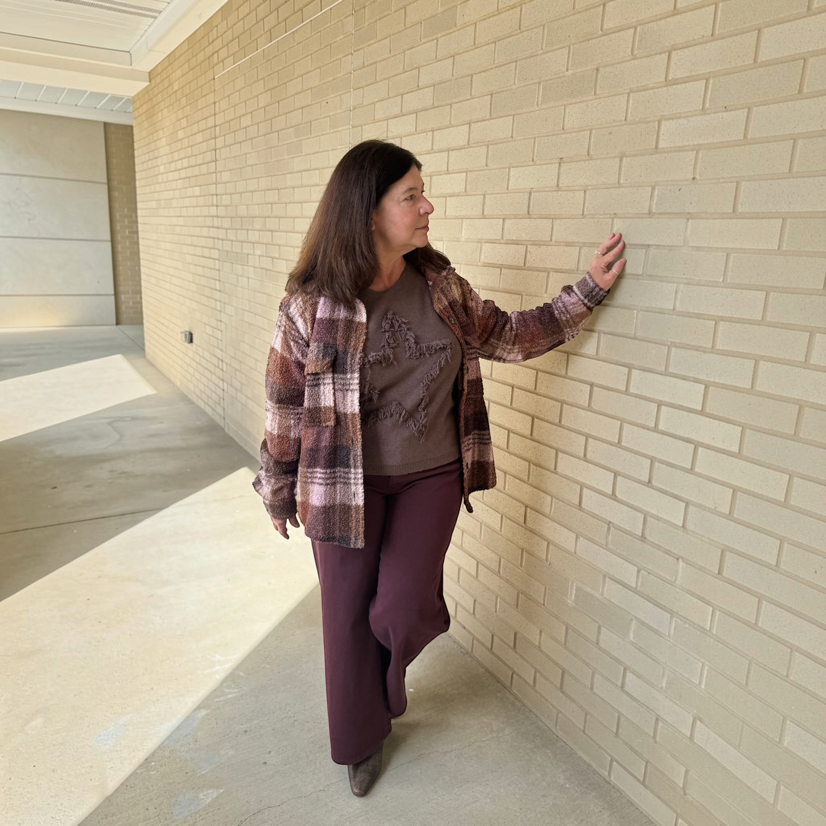 Plum Bottom BEACH LUNCH LOUNGE Tory plaid flannel jacket in brown and pink tones worn over a brown star sweater