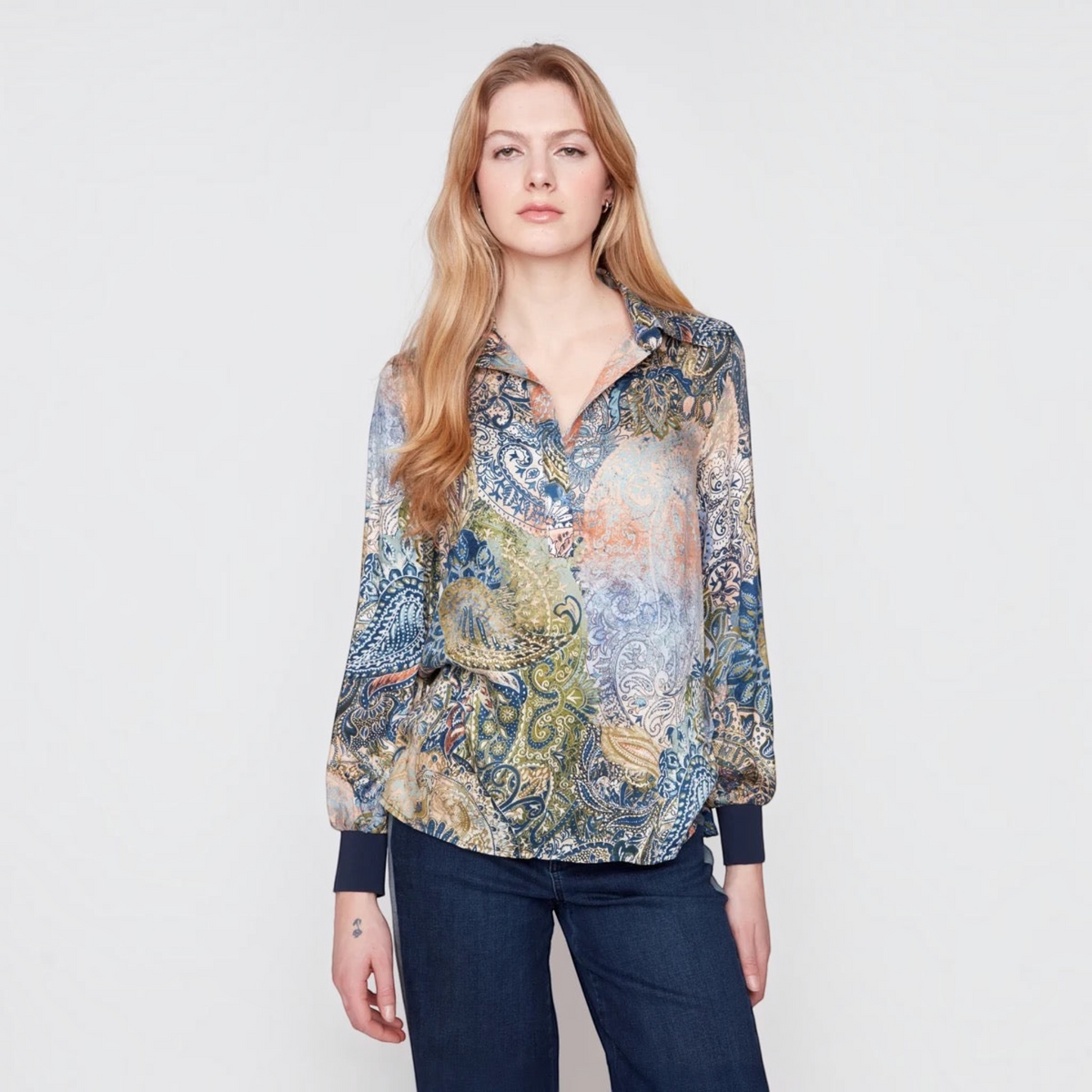Plum Bottom RENUAR olive paisley print blouse with long sleeves and navy cuffs worn by a blonde model