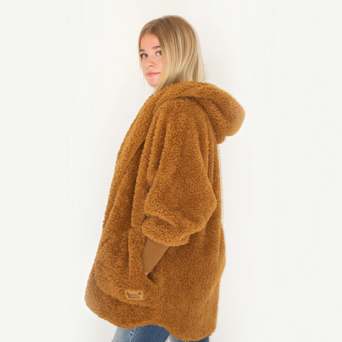 Plum Bottom NORDIC BEACH brown hooded body wrap in fluffy cotton candy fabric worn by a woman