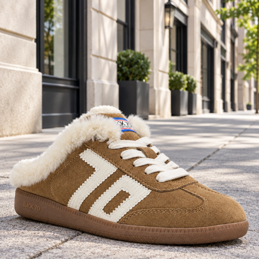 Brown sneaker with white fur lining on a white background