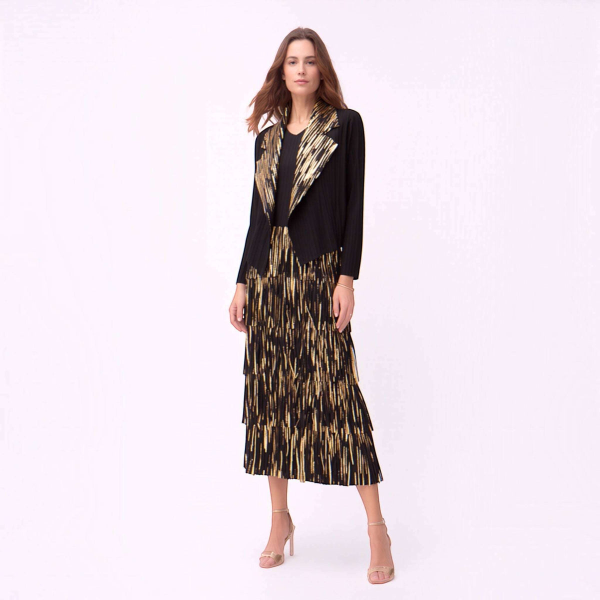 Plum Bottom Ellyndale black and gold pleated sleeveless dress and jacket set with fringe trim and foil print.