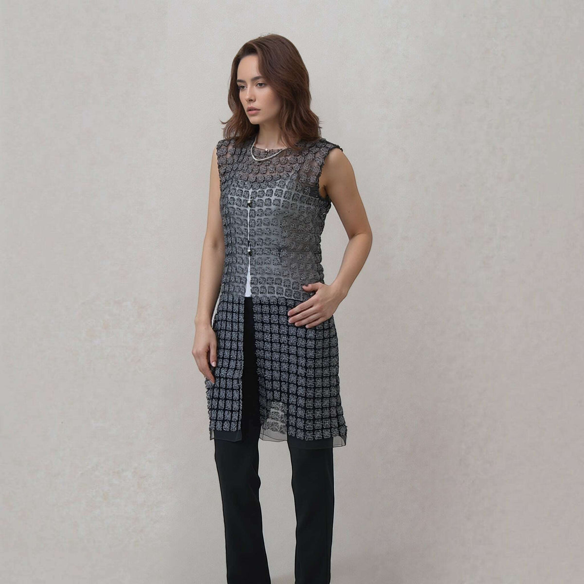 Plum Bottom ELLYNDALE black lace organza sleeveless long vest with pearl buttons worn by a model