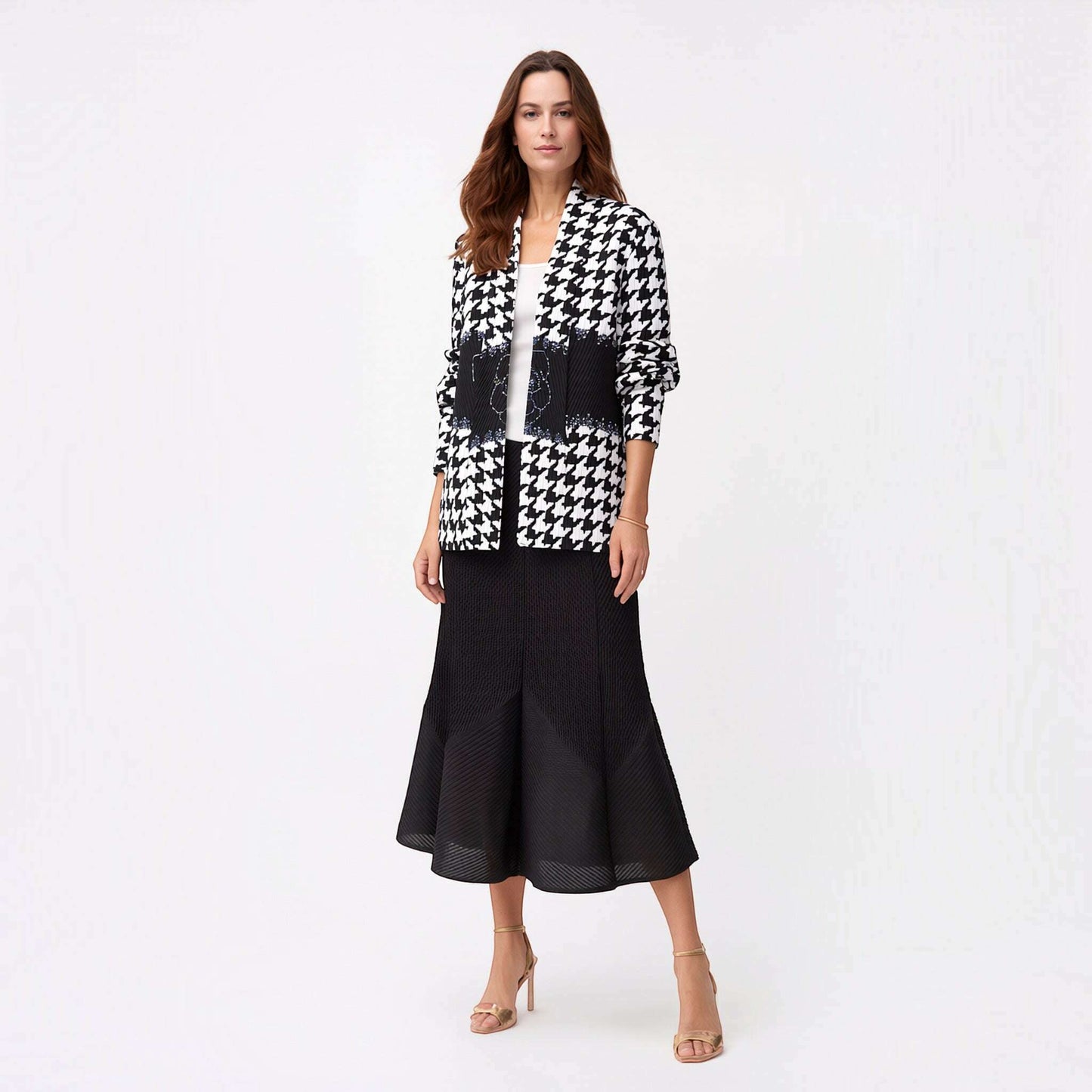 Plum Bottom Ellyndale pleated jacket with a shawl collar in a black and white houndstooth pattern on a model.