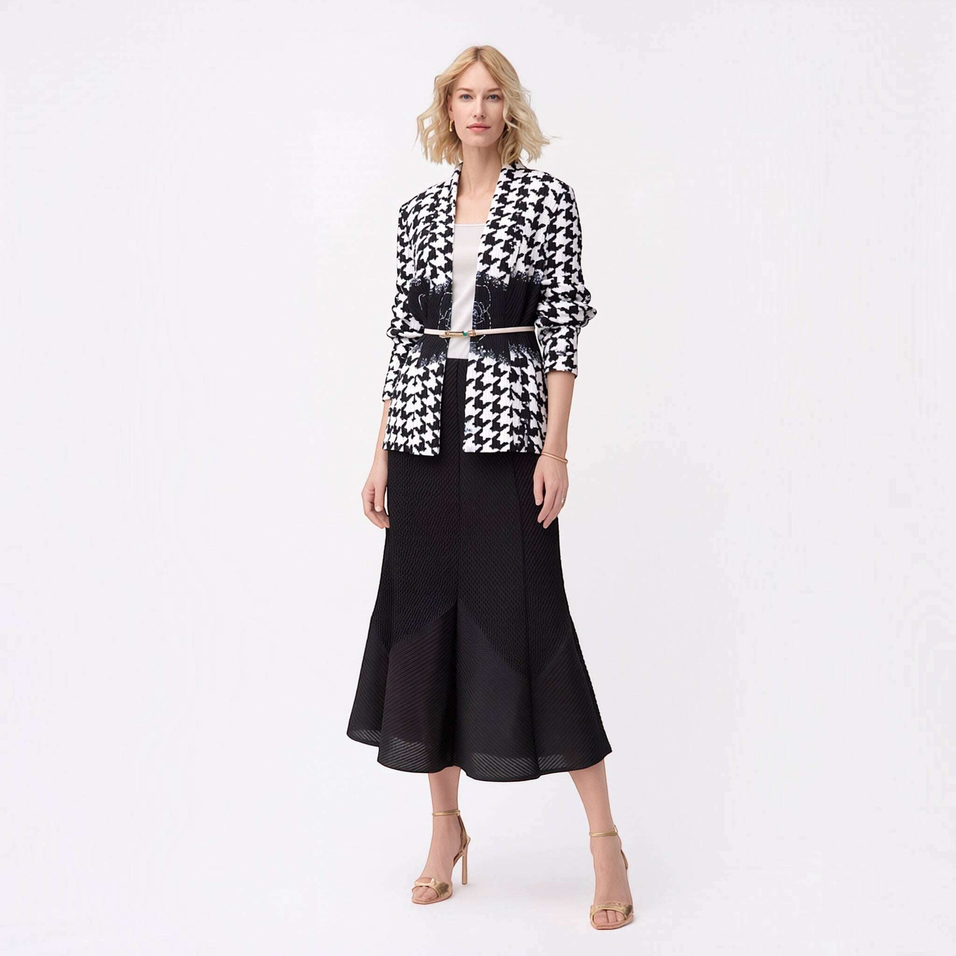 Plum Bottom Ellyndale pleated houndstooth jacket with shawl collar worn by a model with a black midi skirt