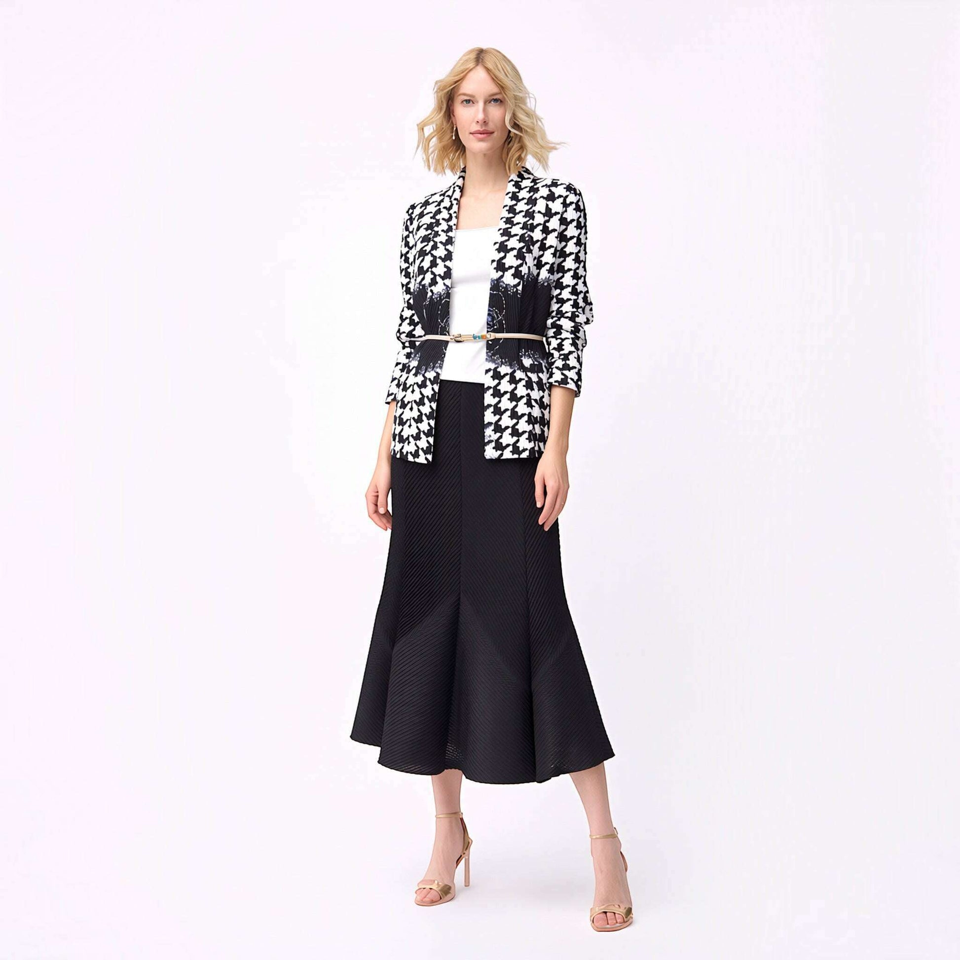 Plum Bottom Ellyndale pleated jacket with a black and white houndstooth pattern and elegant shawl collar