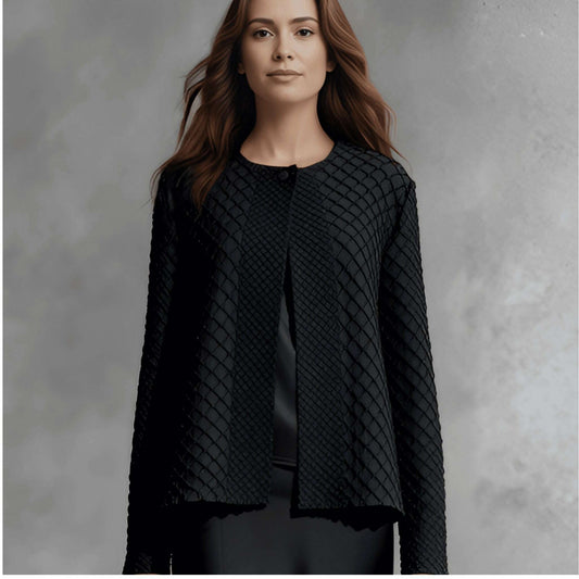 Plum Bottom ELLYNDALE black waffle weave pleated jacket with a round neckline and structured open front design.