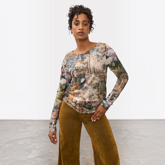 Plum Bottom FDJ floral mesh scoop neck top with ruched long sleeves worn by a model with brown corduroy pants.