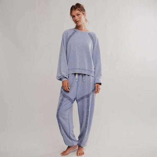 Plum Bottom FREE PEOPLE Couch Club PJ set in light blue with delicate lace trim details on sweatshirt and joggers.