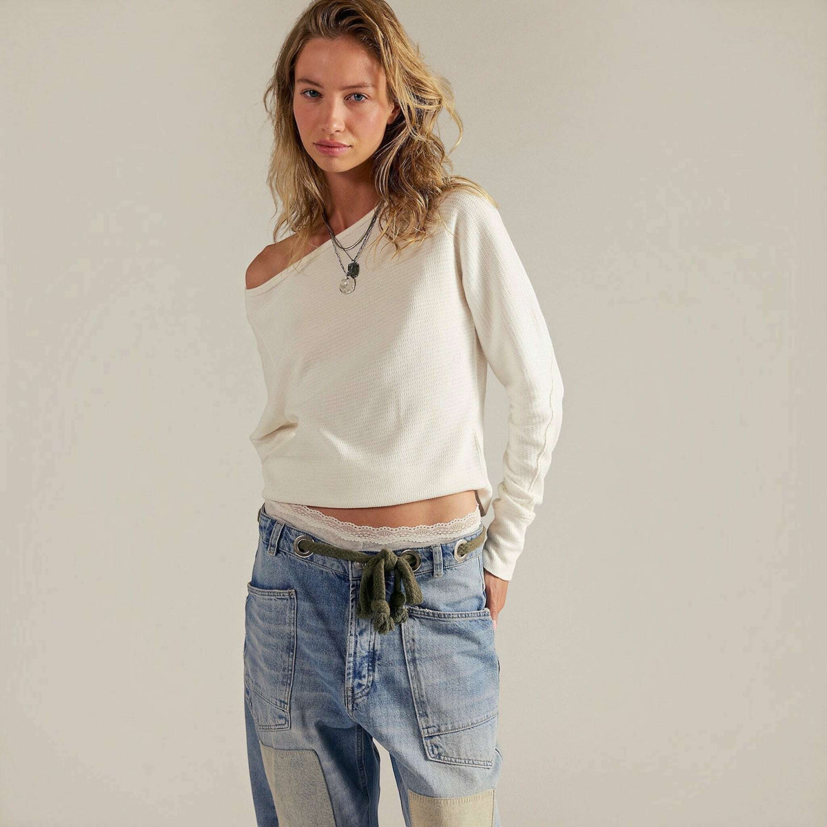 Plum Bottom Free People Jess long sleeve thermal top in white with a relaxed boat neckline and slouchy dolman sleeves.