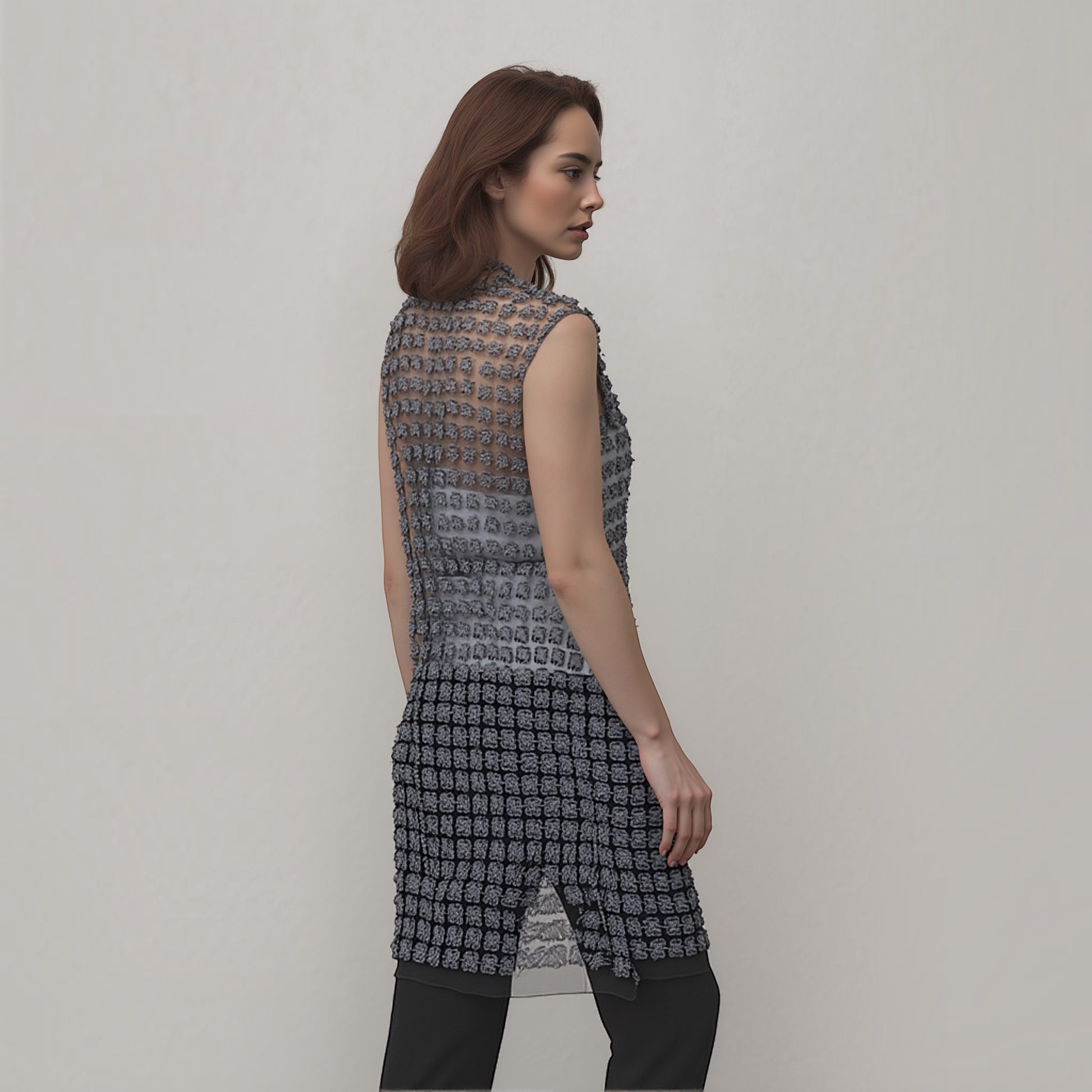 Plum Bottom ELLYNDALE black sleeveless organza vest with textured lace pattern and pearl button front detail