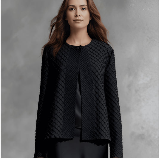 Plum Bottom ELLYNDALE black waffle weave pleated jacket with a round neckline and structured open front design.