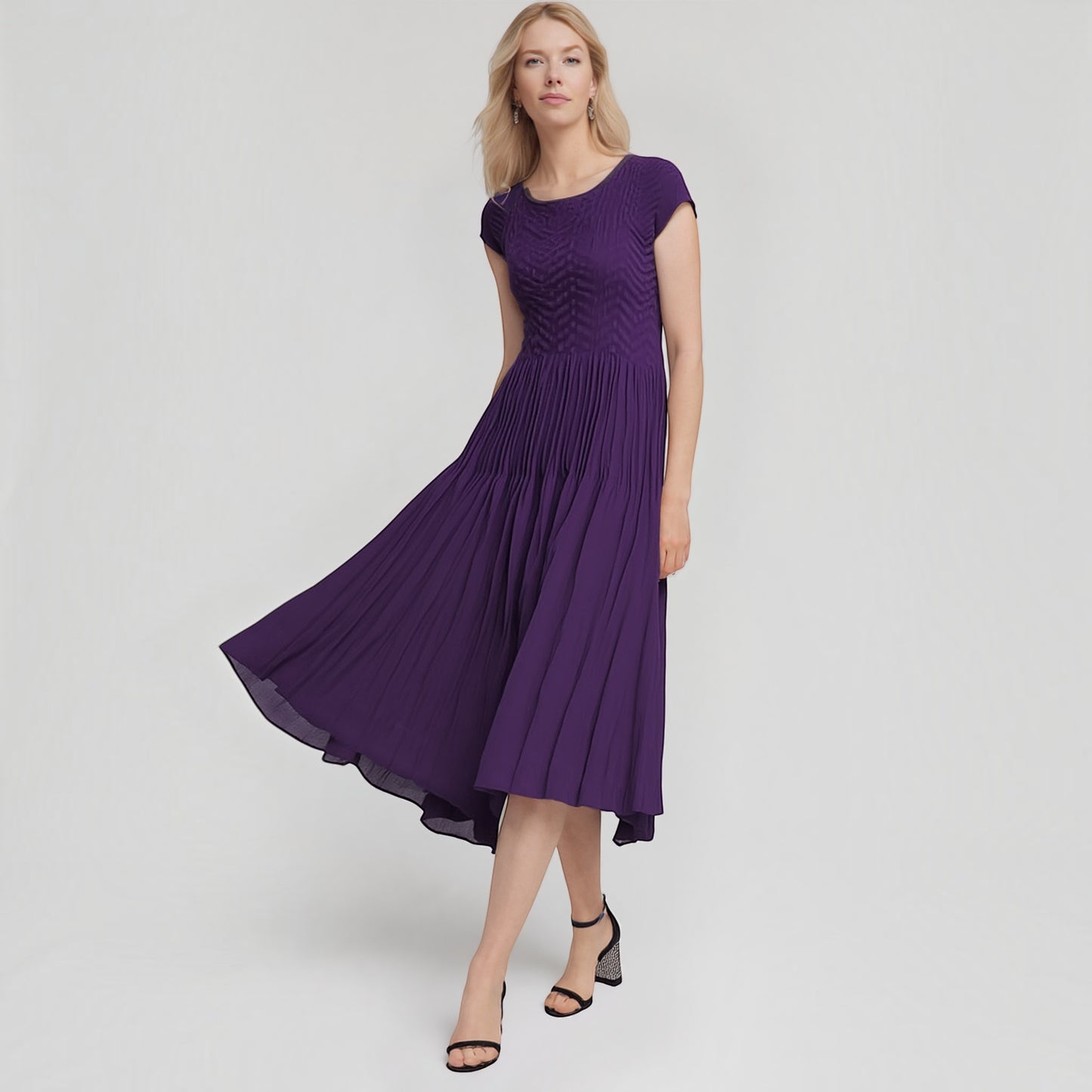 Plum Bottom ELLYNDALE violet pleated midi dress with cupsleeves worn by a blonde model on a white background