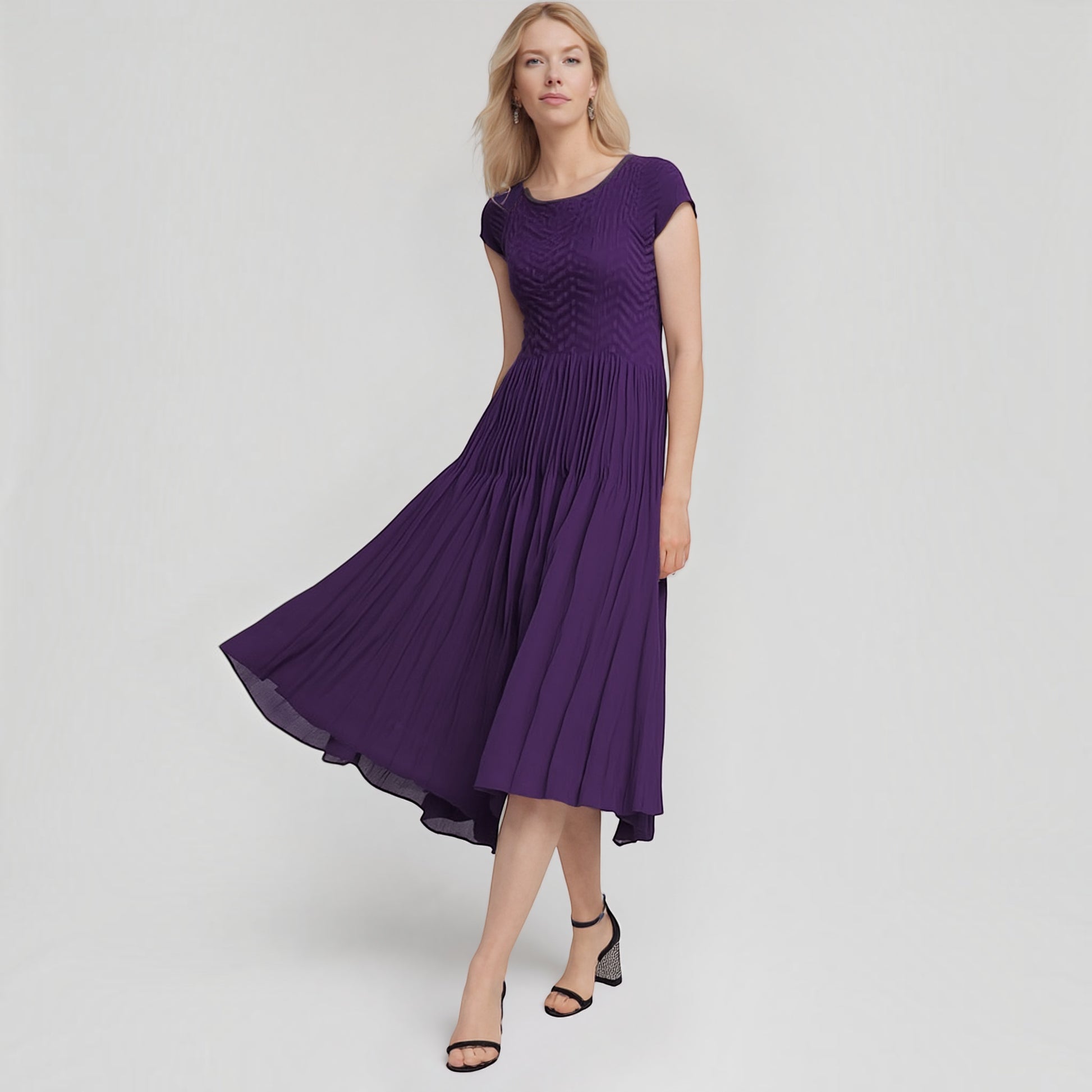 Plum Bottom ELLYNDALE violet pleated midi dress with cupsleeves worn by a blonde model on a white background