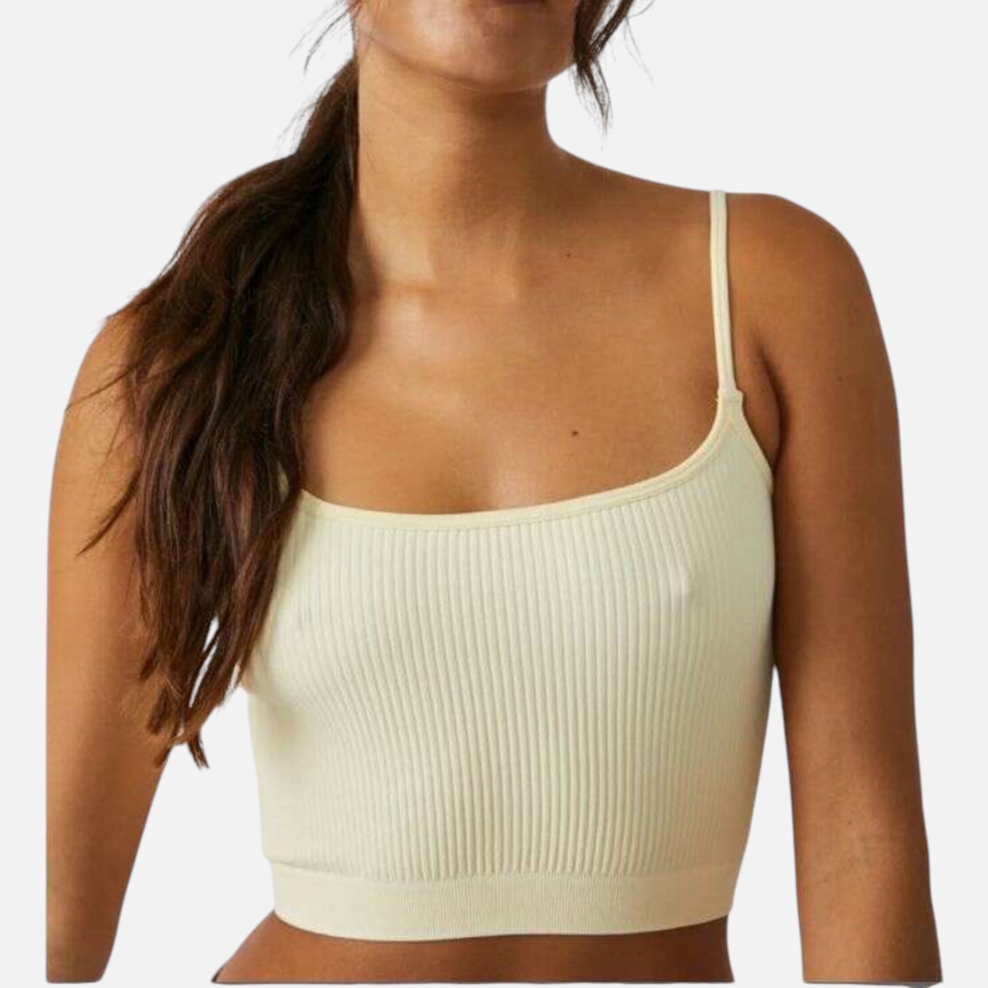 Plum Bottom Free People recycled ribbed brami in a cream shade with pale yellow undertones and thin spaghetti straps.