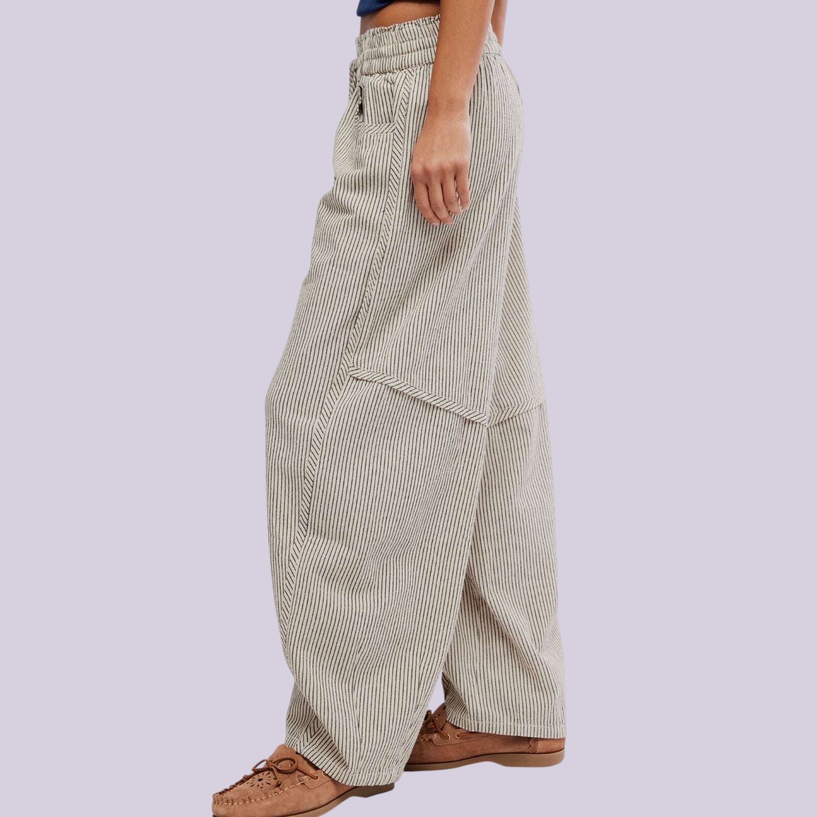 Plum Bottom FREE PEOPLE Something Good barrel pants in beige with micro stripes, drawstring waist, and raw-edge seams.