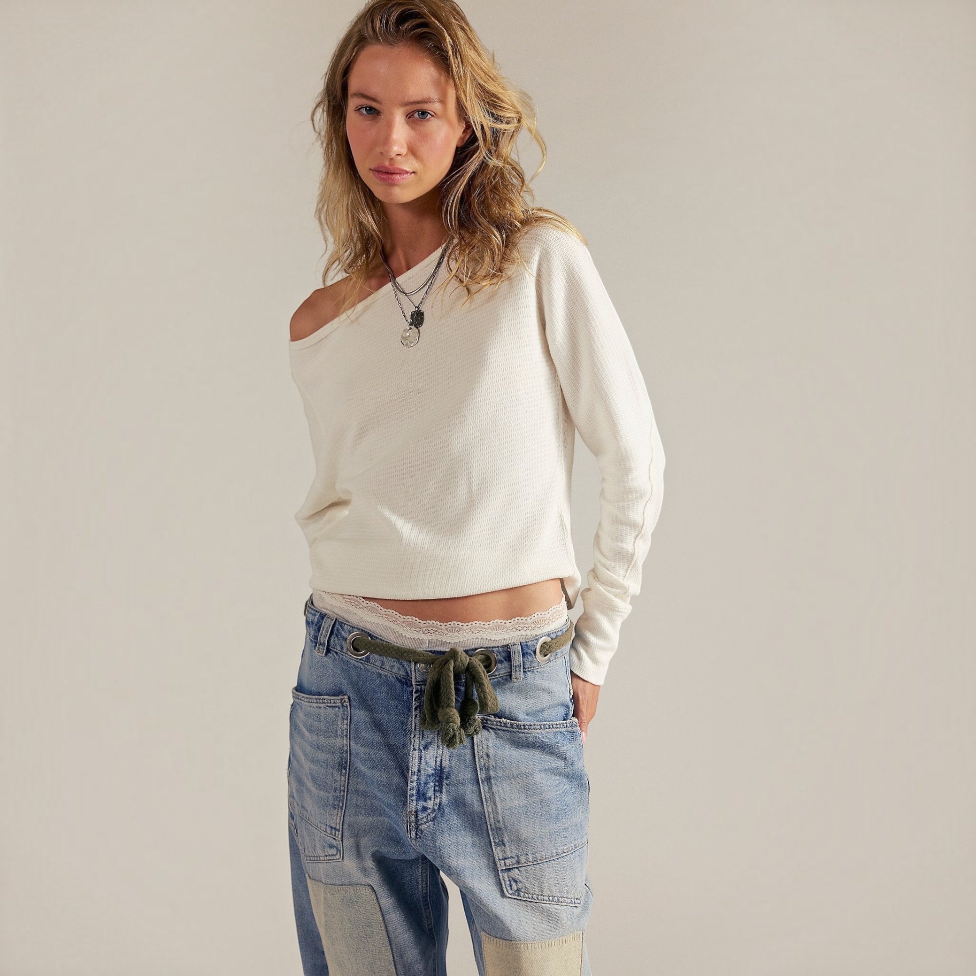 Plum Bottom Free People Jess long sleeve thermal top in white with a relaxed boat neckline and slouchy dolman sleeves.