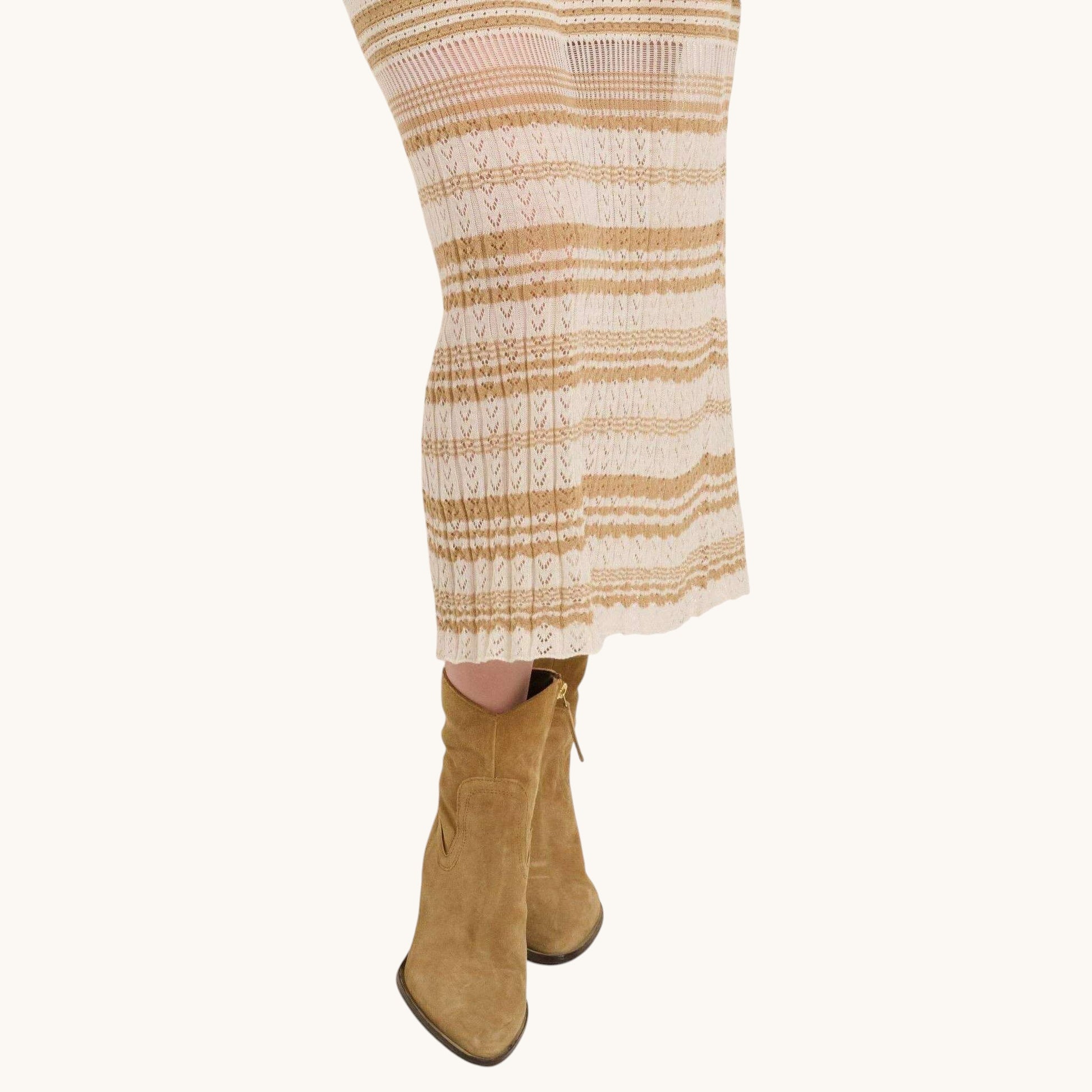 Plum Bottom Seventy Eight and Sunny Ruby midi crochet dress with sheer pointelle stripes worn with tan suede boots