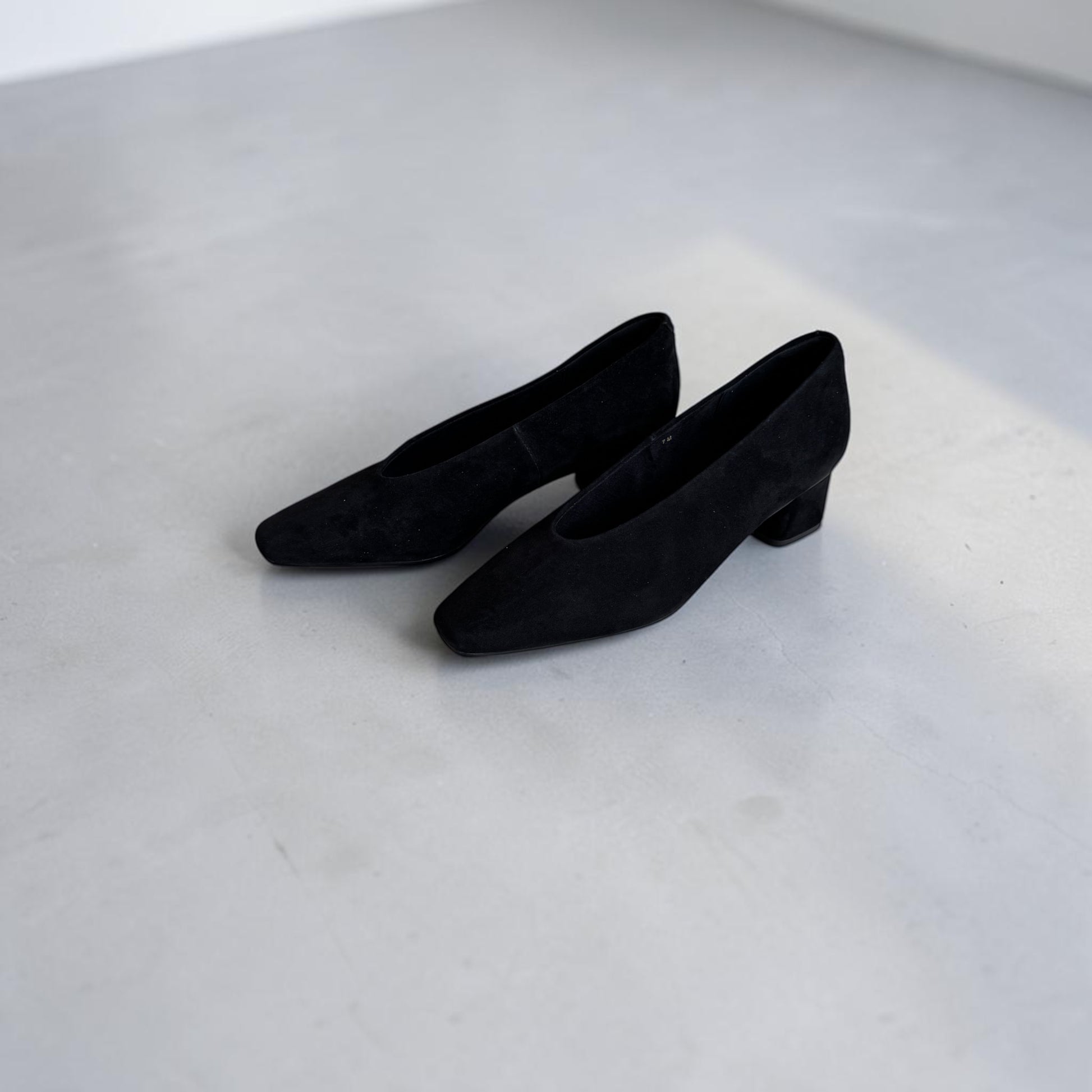 Plum Bottom VANELI Solara black suede pumps with a modern square toe and comfortable low block heel.