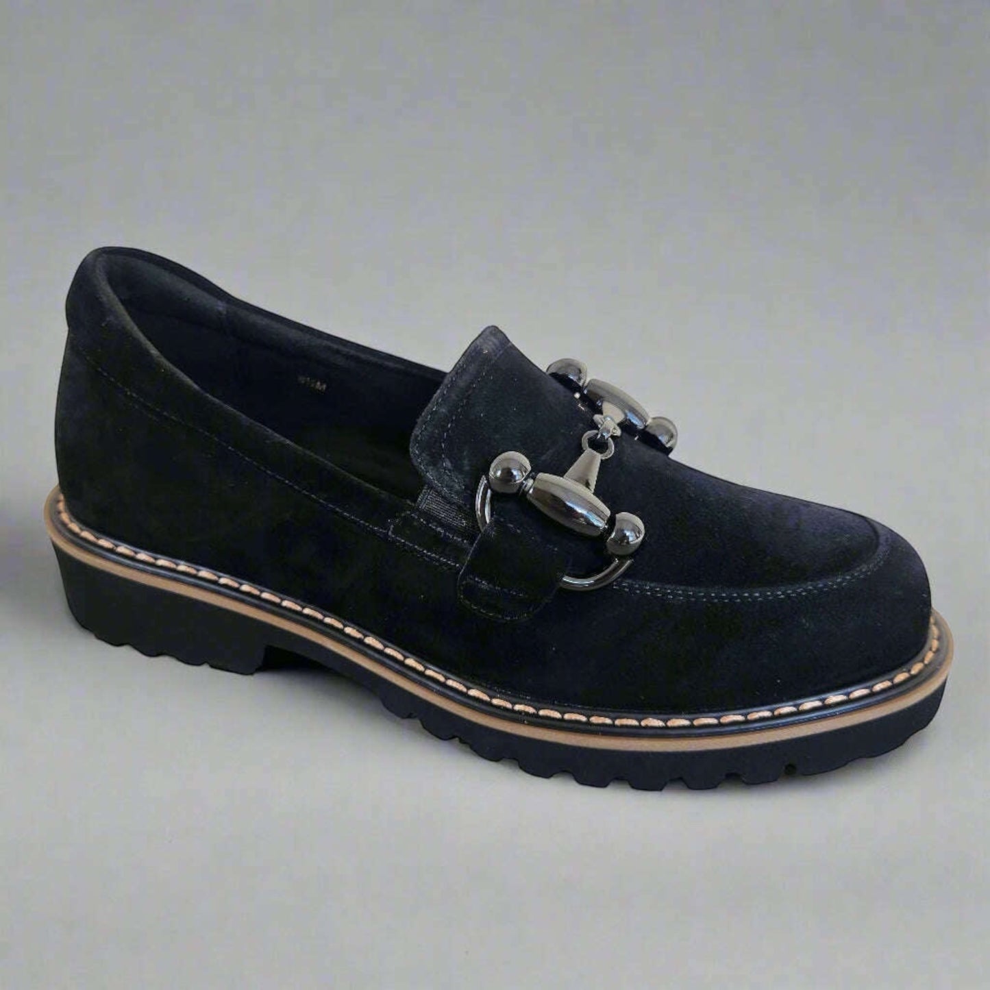 Plum Bottom VANELI Zimmy black suede loafer with shiny metal bit, lug sole, and contrasting tanned welt stitching.