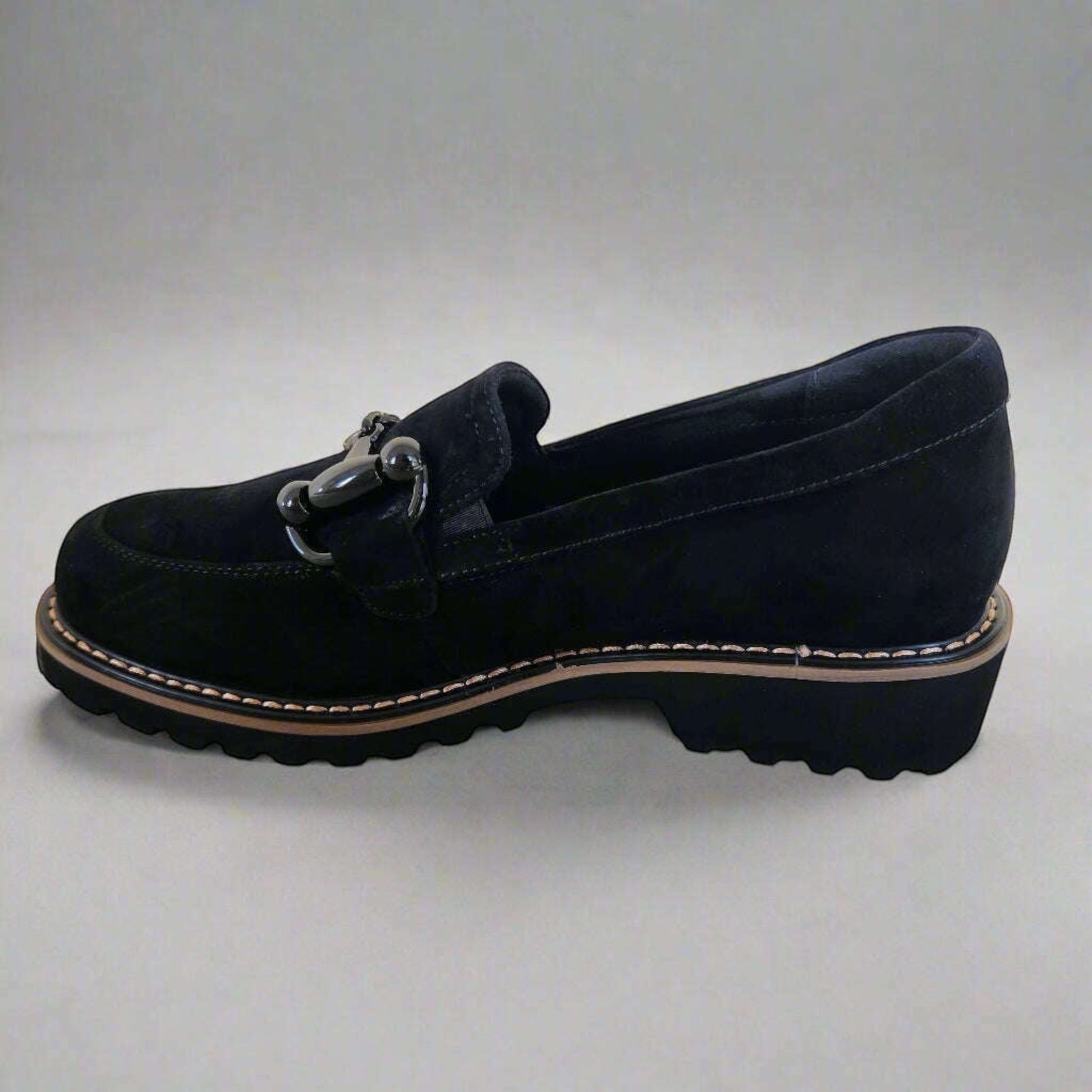 Plum Bottom VANELI Zimmy black suede loafer with shiny metal bit, lug sole, and tan welt stitching side view