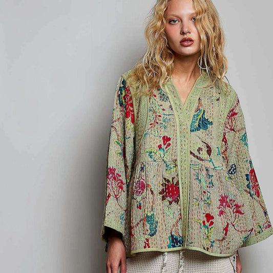 Plum Bottom Pol Clothing quilted floral kimono-style top in powder olive with contrast hand-stitch detailing.