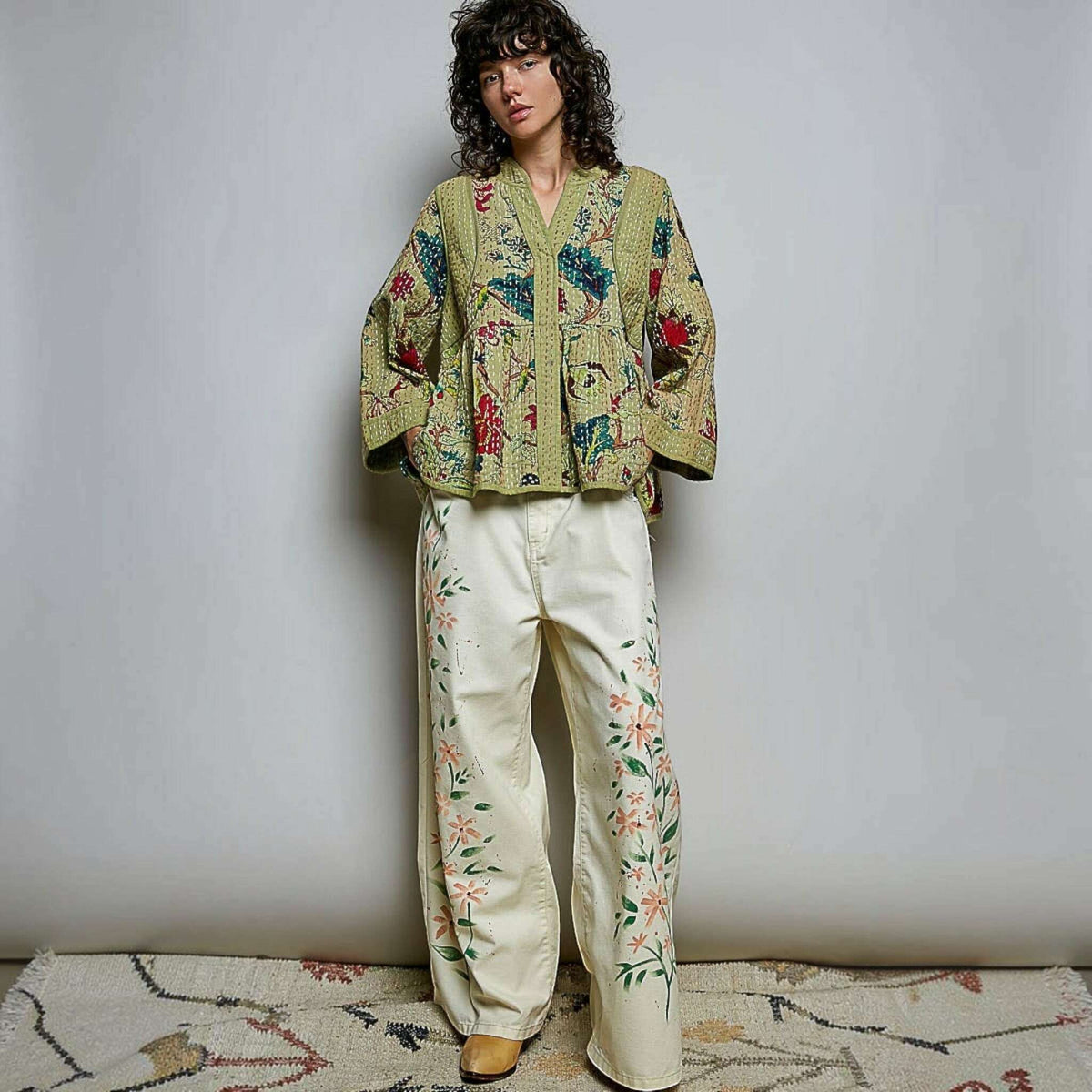 Plum Bottom Pol Clothing quilted floral kimono-style top in powder olive with hand-stitch detail and wide sleeves
