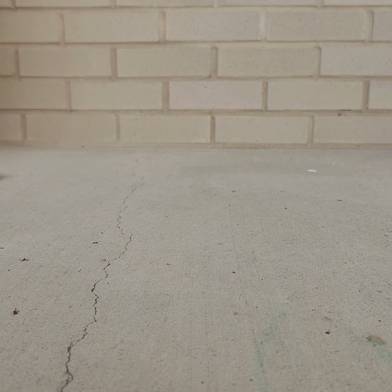 Video of flat brown suede shoe walking