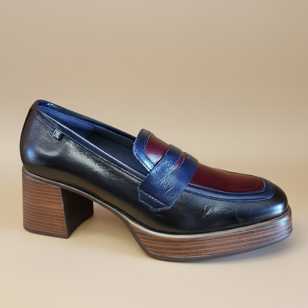 High heel platform loafer with stacked wooden heel.  Mixed burgundy, navy and black leather.  Penny loafer style. 