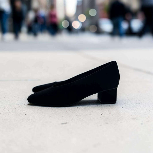 Plum Bottom VANELI Solara black suede pump with a square toe and low block heel, side profile view.