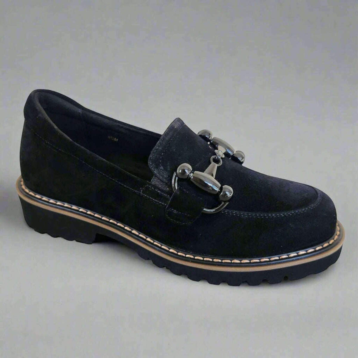 Plum Bottom VANELI Zimmy black suede loafer with shiny metal bit, lug sole, and contrasting tanned welt stitching.